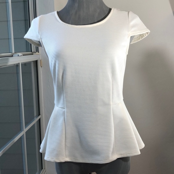 Striking Architectural Peplum Top - Picture 2 of 10